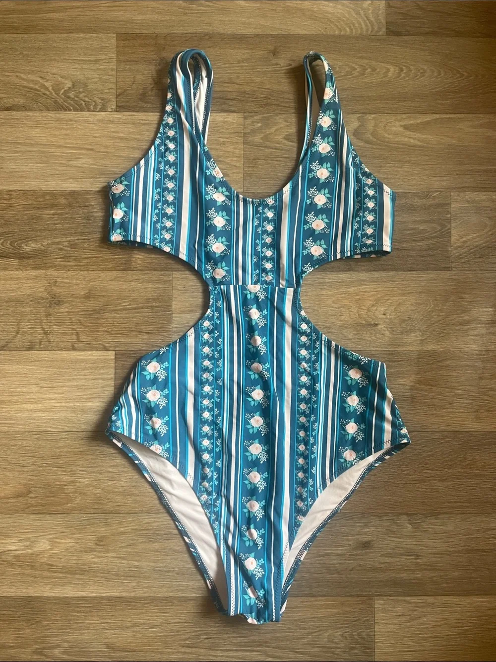 Blue One Piece swimsuit with open back